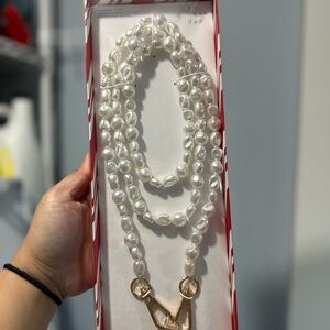 Elegant Pearl phone holder with Gold Accents